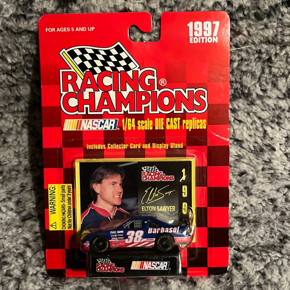 1997 NASCAR Die Cast Replica of the Barbasol car driven by Elton Sawyer. BNWT